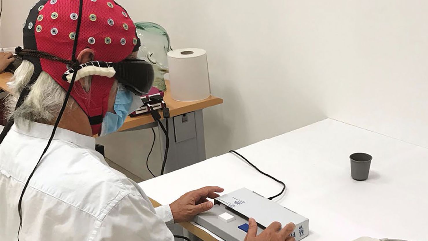 Senior reading comfortably with glasses